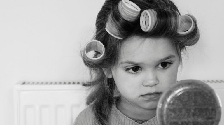 Canva stock photo little girl in curlers