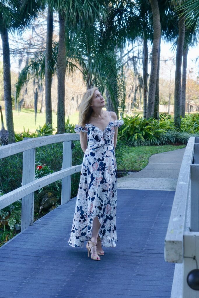 Nina from Sharing A journey in Green floral dress. How to be the perfect wedding guest