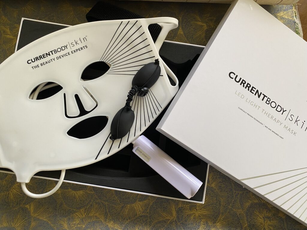 Flat Lay Current Body mask and accessories