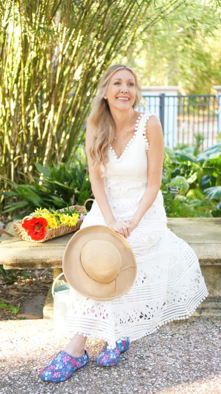 Nina Anders wearing white sundress