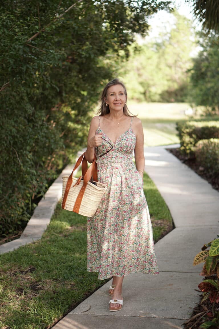 Nina Anders wearing floral sundress