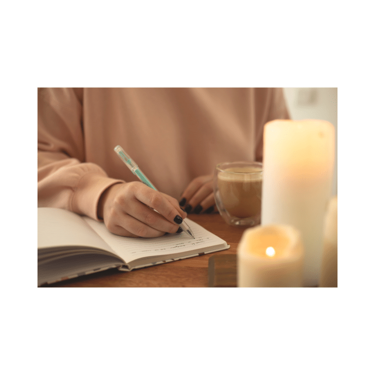 woman writing in a journal